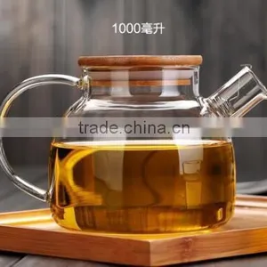 Made in China Glass Teapot Kettle With Measurement Scale Wooden Lid Handmade thumbnail-2
