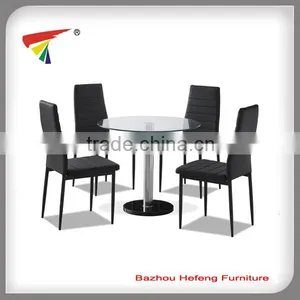 Modern Round Glass Dining Table With Black PVC Chair thumbnail-1