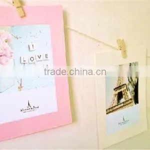 Colourful Paper Picture Frames Hanging Over at the Wall thumbnail-2