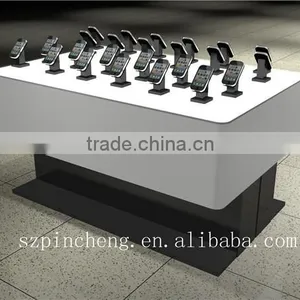 Mobile Phone Store Interior Design With Small Acrylic Case thumbnail-1
