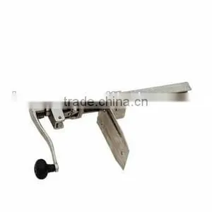 Cast Iron Can Opener on Table Use thumbnail-1