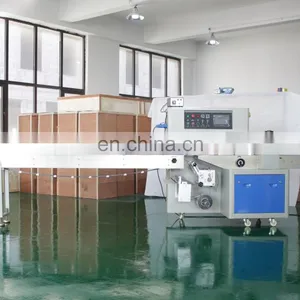 China Supplier Rice Cake Packaging Machine Washrag Parcel Wrapping Machine thumbnail-6