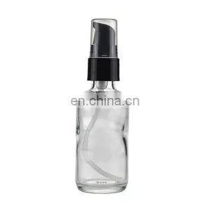 2oz Clear Glass Boston Round Bottles With White Black Treatment Pump thumbnail-1