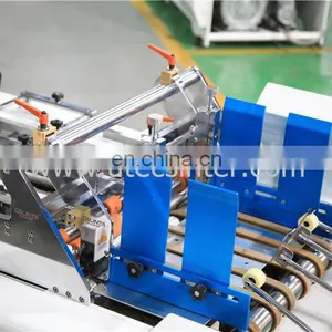 UTM650B Automatic Kraft Gift Paper Packaging Box Window Patching Making Machine With Rotary Plastic Film Cut thumbnail-2