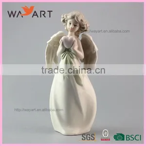 Unique Decorative White Ceramic Angel Statue With Heart thumbnail-2