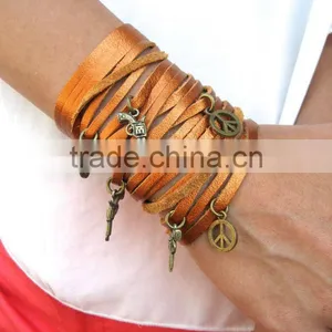 Sliced Leather Bracelet, Wide Leather Cuff - Charms Bracelet, Multi Strap Bracelet With Peace and Gun Charms thumbnail-1