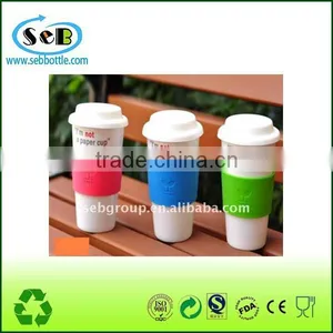 White Ceramic Cup With Lid and Silicone Sleeve thumbnail-1