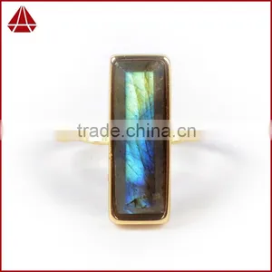 Natural Faceted Rectangle Labradorite Gemstone Set Into a 18k Gold Bezel Ring thumbnail-1