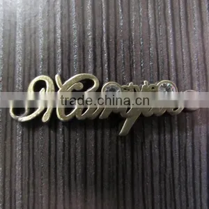 Customized Logo Design for Garments Metal Plate thumbnail-2