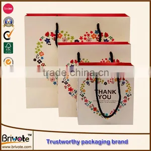 Customized From Dongguan Folding Paper Hand Bag thumbnail-1