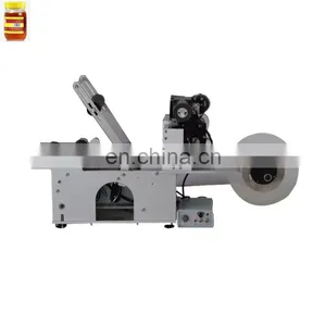 Packaging Machinery Automatic Nail Polish Lip Balm Lipstick Mascara Tube Bottom Sticker Labeling Machine thumbnail-1