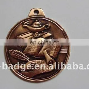 Antique Brass Medal With an Oil Lamp Book and Feather With Writing thumbnail-1