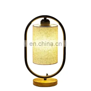 Tonghua New Linen Shade Metal Frame Round Wood Base Modern LED Edison Bulb Table Lamp Bedside Desk Light thumbnail-1