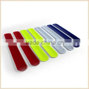 A PAIR OF HIGH-VIZ KIDS REFLECTIVE SLAP SNAP BANDS FLUORESCENT SAFETY STRAPS thumbnail-2