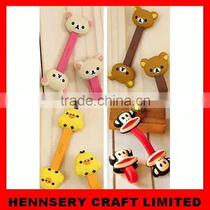 Customized Shape and Logo Soft Pvc Rubber Dog Bone Shape Silicone Earphone Cable Winder thumbnail-1