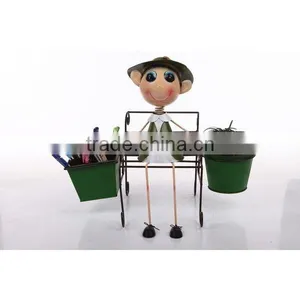 BOY ON SOFA WITH POT & PENCIL BOX thumbnail-1