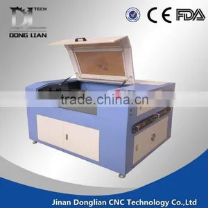 Cheap Beautiful Design Jinan Donglian Laser Cutting and Engraving Machine Price for Coconut Shell thumbnail-1