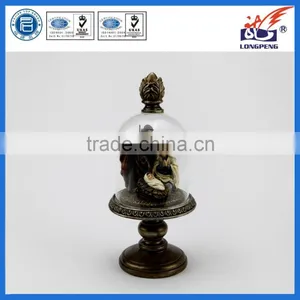 Regal Holy Family With Decorative Glass Hurricane and Bronze-Look Finial and Pedestal Base thumbnail-1