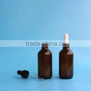 2 oz Glossy Amber Boston Round Glass Bottle With Dropper thumbnail-1