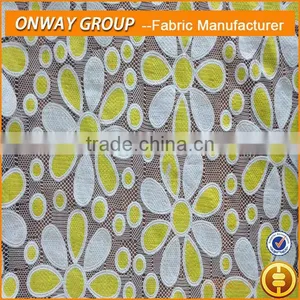 Shaoxing China Textile City Produced Ladies Fashion Wear in Polyester Cotton Burn-out African Net Lace Fabric thumbnail-1