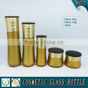Gold Yellow Coloured Cosmetic Glass Bottle and Cosmetic Glass Cream Jar thumbnail-1