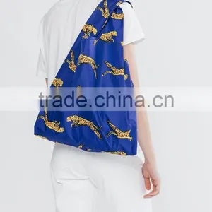 Assorted Color ECO Handle Grocery Trendy Sturdy Foldable Pocket Tote Bag Folded up and Stored in a Small Carrying Pouch thumbnail-3