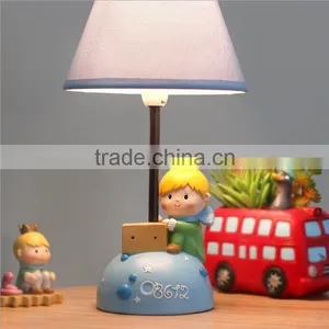 Creative Cartoon Children Reading Prince Shaped Resin Led Table Lamp thumbnail-1