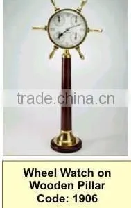 Whell Watch on Piller With Wooden Base thumbnail-1