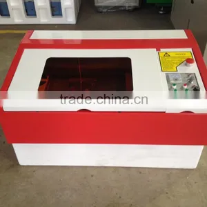 Cheap Wood Laser Cutting Machine Small Leather Craft Laser Cutting Machine thumbnail-1