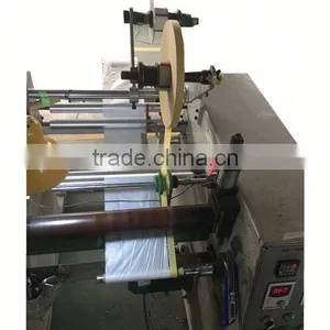 Creative Half Roll Layer pe Plastic Roll Packaging Film Rewind Machine thumbnail-1