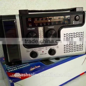 Mini Portable AM FM Radio With Dynamo Crank Power Torch thumbnail-1