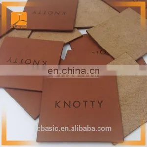 Custom Wholesale Debossed Logo Genuine Leather Label for Jeans Trousers thumbnail-2
