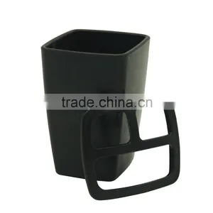 Black Toothbrush Holder Toothbrush and Toothpaste Inside thumbnail-1