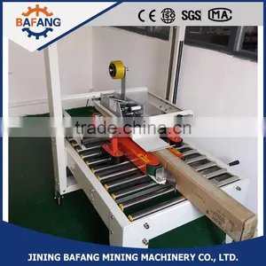 Semi-auto Boxes Sealing Strapping Machine thumbnail-1