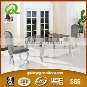 Stainless Steel Frame Rectangle Black Glass Top Dining Table thumbnail-1