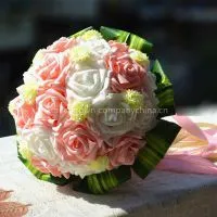 Pink and Green Leaves Bride Holding Flowers thumbnail-1