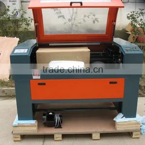 Huahai CE FDA 60w 80w 100w 150w CO2 Laser Cutting Machine Price With Red Dot Motorized Z-axis Rotary Attachment thumbnail-1