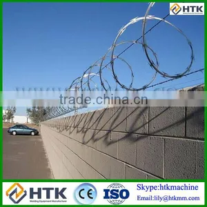 Low Price 450mm Coil Diameter Concertina Razor Blade Tape Military Concertina Wire for Sale thumbnail-1