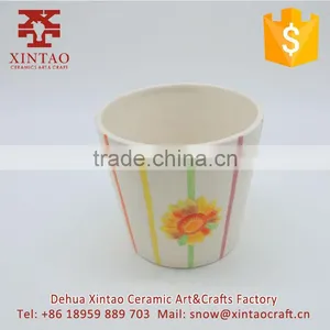 Set of 2 Colored Sunburst Design Ceramic Flower Planter Pots / Decorative Plant Container thumbnail-1