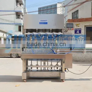 SPX-Automatic 4 Nozzles Liquid Filling Machine for Bottle thumbnail-1