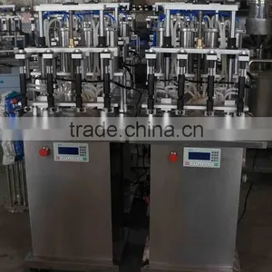 China Guangzhou Factory Small Perfume Bottle Four Head Filling Machine/equipment With Negative Pressure for Sale thumbnail-2