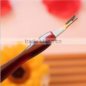 Small Plastic Cuticle Pusher thumbnail-1