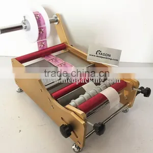 Manual Round Bottle Sticker Label Machine Labels on Round Bottle/round Jar/cylinder thumbnail-4