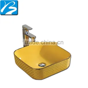 Beautiful White Bathroom Ceramic Vanity Golden Color Counter Top Basin thumbnail-1