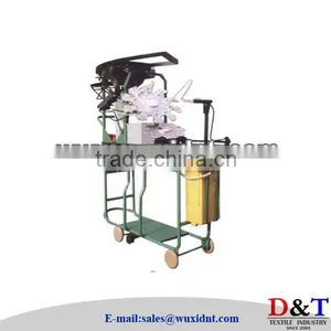 TEXTILE MACHINE BOBBIN DOFFING AND DONNING DEVICE thumbnail-1