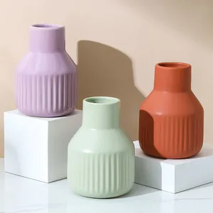 China Hand Made Small Cyan Red Light Yellow Ceramic Flower Vase For Bedroom And Hotel thumbnail-1