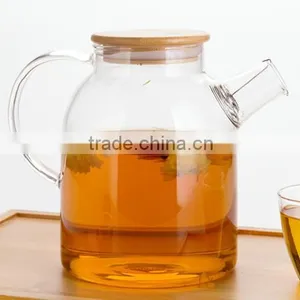Made in China Glass Teapot Kettle With Measurement Scale Wooden Lid Handmade thumbnail-1