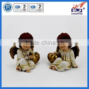 European Sitting Poly Angel With Heart Statue for Home Decor thumbnail-1