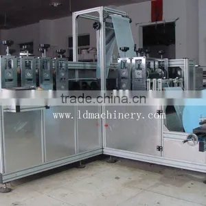 Non Woven Shoe Cover Making Machine thumbnail-1