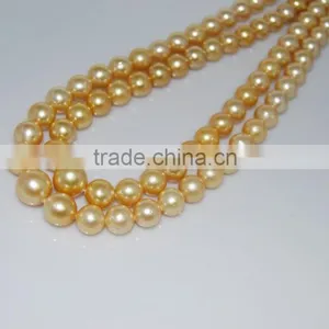 10-11mm AA Golden Round South Sea Pearl Strands thumbnail-1